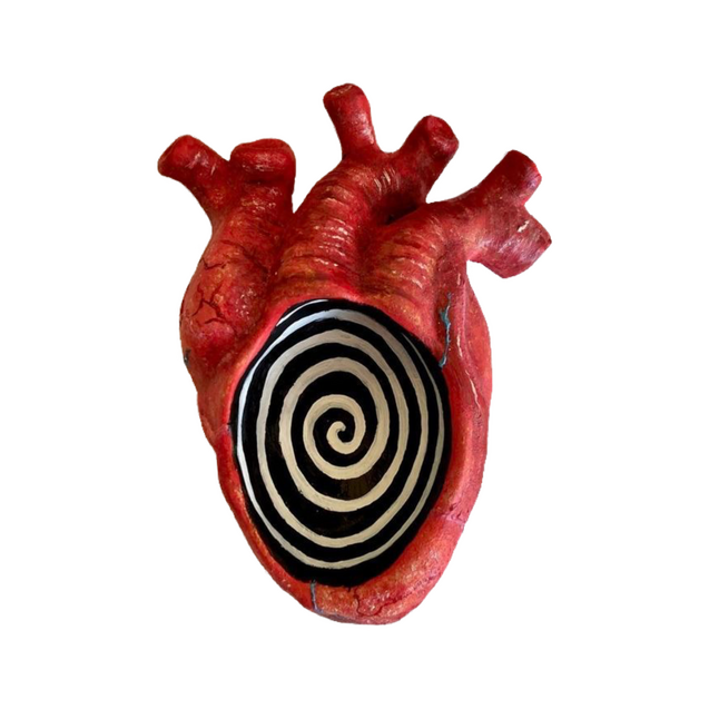 a red anatomical heart with recess in which there is a black-and-white spiral